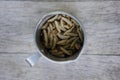 Waxworms in a measuring cup Royalty Free Stock Photo