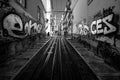 On the way of the Bika funicular. Streets of the old city of Lisbon. Black and white Royalty Free Stock Photo