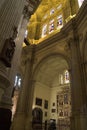 Way of the cross in big pillar and stained glass windows in Malaga Cathedral