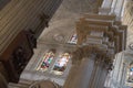 Way of the cross, big pillar and stained glass windows in Malaga Cathedral