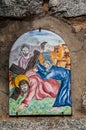 Way of the cross. 3rd Station. Jesus falls for the first time. Hand painted ceramic tile, Ingurtosu, Arbus, South Sardinia