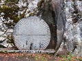 Way of the cross- a round stone closes the grave