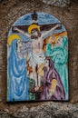 Way of the cross. 12th Station. Jesus dies on the cross. Hand painted ceramic tile, Ingurtosu, Arbus, South Sardinia