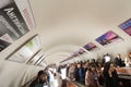 Way down escalator tunnel Royalty Free Stock Photo