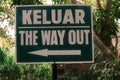The Way Out Direction Sign in English and Indonesian Royalty Free Stock Photo