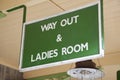 Way Out and Ladies Toilet Sign