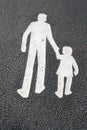 Way for pedestrians - father with child - sign on asphalt Royalty Free Stock Photo