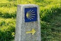 Camino de Santiago sign. Yellow scallop sign pilgrimage to Santiago de Compostela