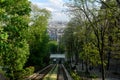 The way without stairs - by elevator from the Basilica of Sacre Coeur from the top of Montmarter for comfortable tourists. Royalty Free Stock Photo