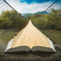 Way by the suspension bridge on the pages of book Royalty Free Stock Photo