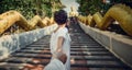 On the way to the Big Buddha. Thailand, Pattaya. The girl is holding the guy by the hand. Follow me. Royalty Free Stock Photo