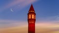 Way to new life . mosque minaret . Sunset and new moon . Royalty Free Stock Photo