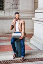 Young East Indian American Businessman traveling, working in New Royalty Free Stock Photo