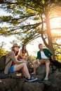 The only way to travel is by foot. three young people hiking while on an overseas trip.