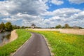 Way to windmill and blue sky, Alkmaar Royalty Free Stock Photo