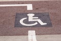 Way of wheel chair in the garden, disabled icon sign on the road in the public park.