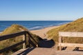 Way of wooden planks leading to the beach of Sylt Royalty Free Stock Photo