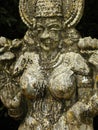 Wayanad, Kerala, India - January 1, 2009 Ancient grunge stone sculpture of mermaid