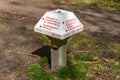 Waymarker in shape of mushroom signpost designed for hikers and cyclists in Hilversum, Netherlands