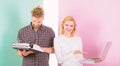 Ways to sell your old stuff for most money. Woman with modern laptop and man with old retro typewriter. Why do you keep Royalty Free Stock Photo