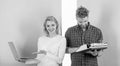 Ways to sell your old stuff for most money. Woman with modern laptop and man with old retro typewriter. Why do you keep Royalty Free Stock Photo