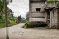 Wayside abandoned 1960s` brick building in cloudy afternoon