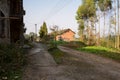 Wayside dilapidated dwelling buildings in deserted factory of 1970s