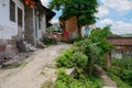 Wayside dilapidated houses in sunny summer, China