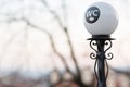 Wc sign on street light pillar in Prague Royalty Free Stock Photo