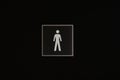 WC toilet signs on a dark black door. The indicator shows that here is the restrooms for boys