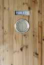 WC toilet wooden door.