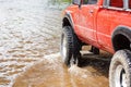 A 4wd truck on flooded road