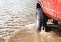 A 4wd truck on flooded road