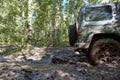 4WD vehicle driving through soft mud Royalty Free Stock Photo