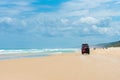 4wd vehicles at Rainbow Beach with coloured sand dunes, QLD, Australia Royalty Free Stock Photo