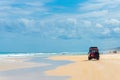 4wd vehicles at Rainbow Beach with coloured sand dunes, QLD, Australia Royalty Free Stock Photo
