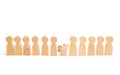 Weak player, worker for dismissal. A row of wooden people and a broken figure of a person among them. The concept of a weak link.