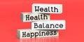 Wealth, health, balance, happiness - words on wooden blocks