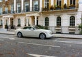 Wealth. The rich/poor divide. Rolls Royce. Eaton Square, London.