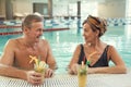 Wealthy Senior Couple in Swimming Pool