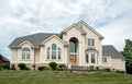 Wealthy Tan Stucco Home Royalty Free Stock Photo