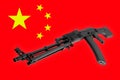 Weapon - Assault rifle China of a flag background Royalty Free Stock Photo