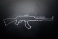 Weapon draw erased on blackboard - no violence concept