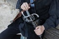 Weapon in the hands of a man at the festival of the Middle Ages, Germany, Burgstein