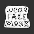 Wear face mask sticker ready for print. Hand drawn black lettering. Second wave of coronavirus new normal. Health care preventing Royalty Free Stock Photo