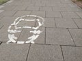 Wear face masks sign on pavement shows pictogram of a person wearing a face mask to prevent disease COVID 19 infections for face