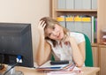 Weariness woman in office