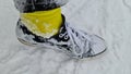 Wearing chucks in deep snow with yellow socks iced up!