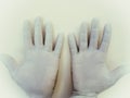 Wearing gloves in the hospital helps prevent the spread of germs Royalty Free Stock Photo