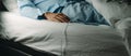 wearing a urinary catheterization in bed, panoramic Royalty Free Stock Photo